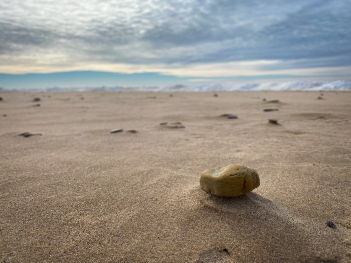 Pebble on the beach by Mark Swanson